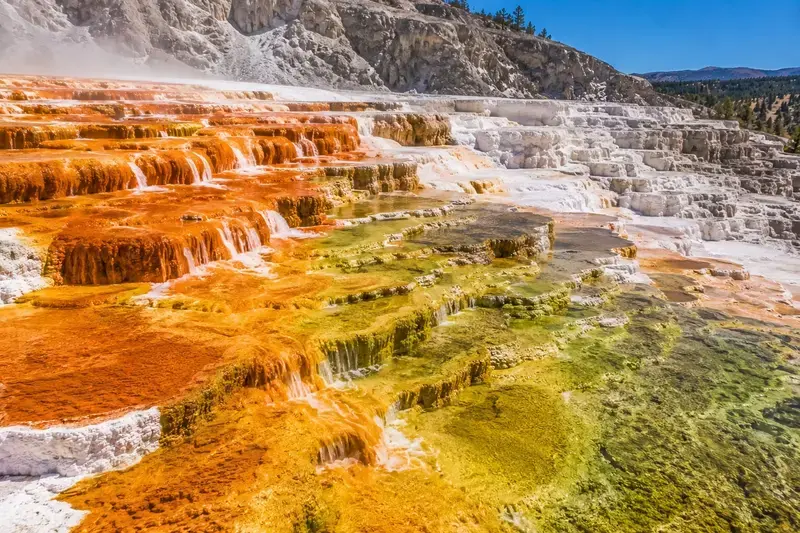 Adventure Quest artwork for the “Colors of Life” mission in Mammoth Hot Springs.
